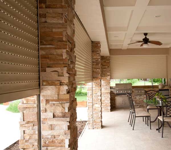 Patio shutter or screen setup on outdoor patio