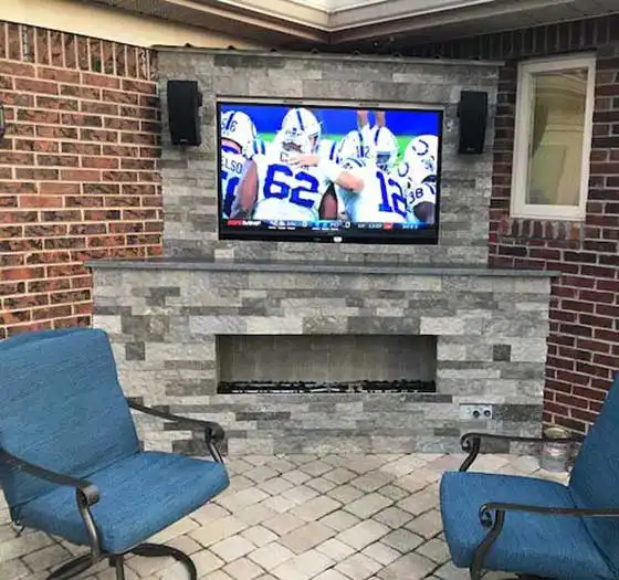 TV mounted inside a room with security screen visible