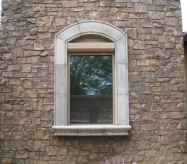 Residential window secured with shutters